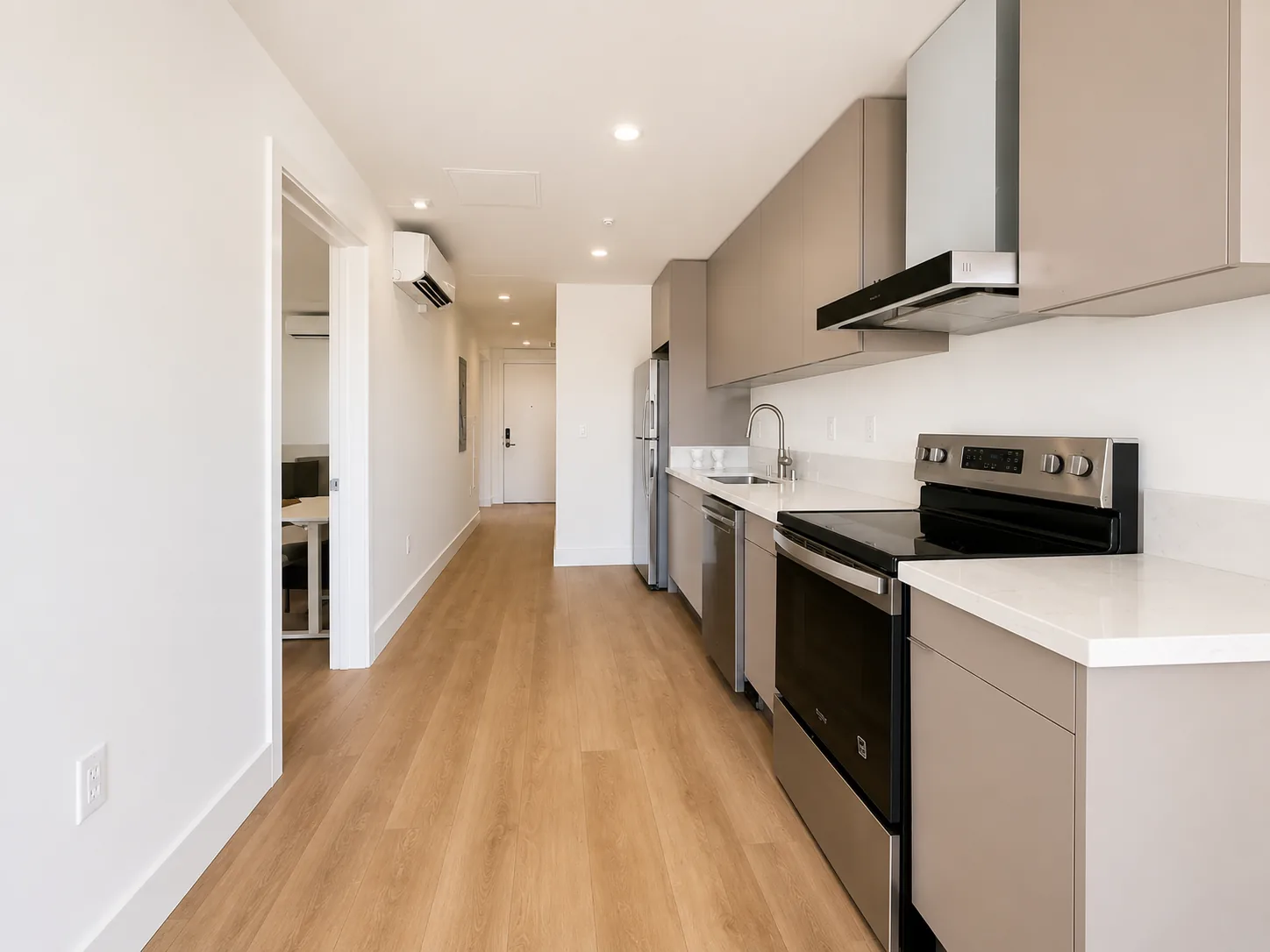 Actual Unit 202 kitchen and corridor included in the shared-space cleaning routine